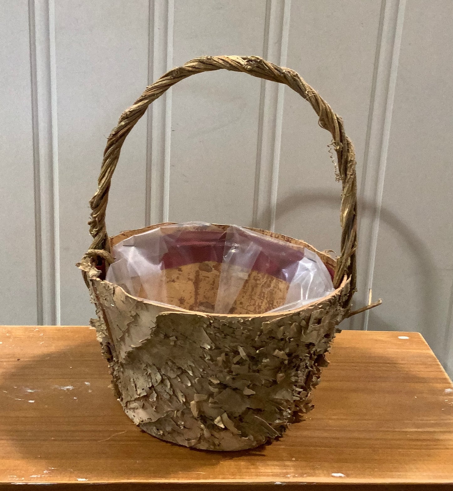 HOF61991 - Basket with Twisted Vine Handle.